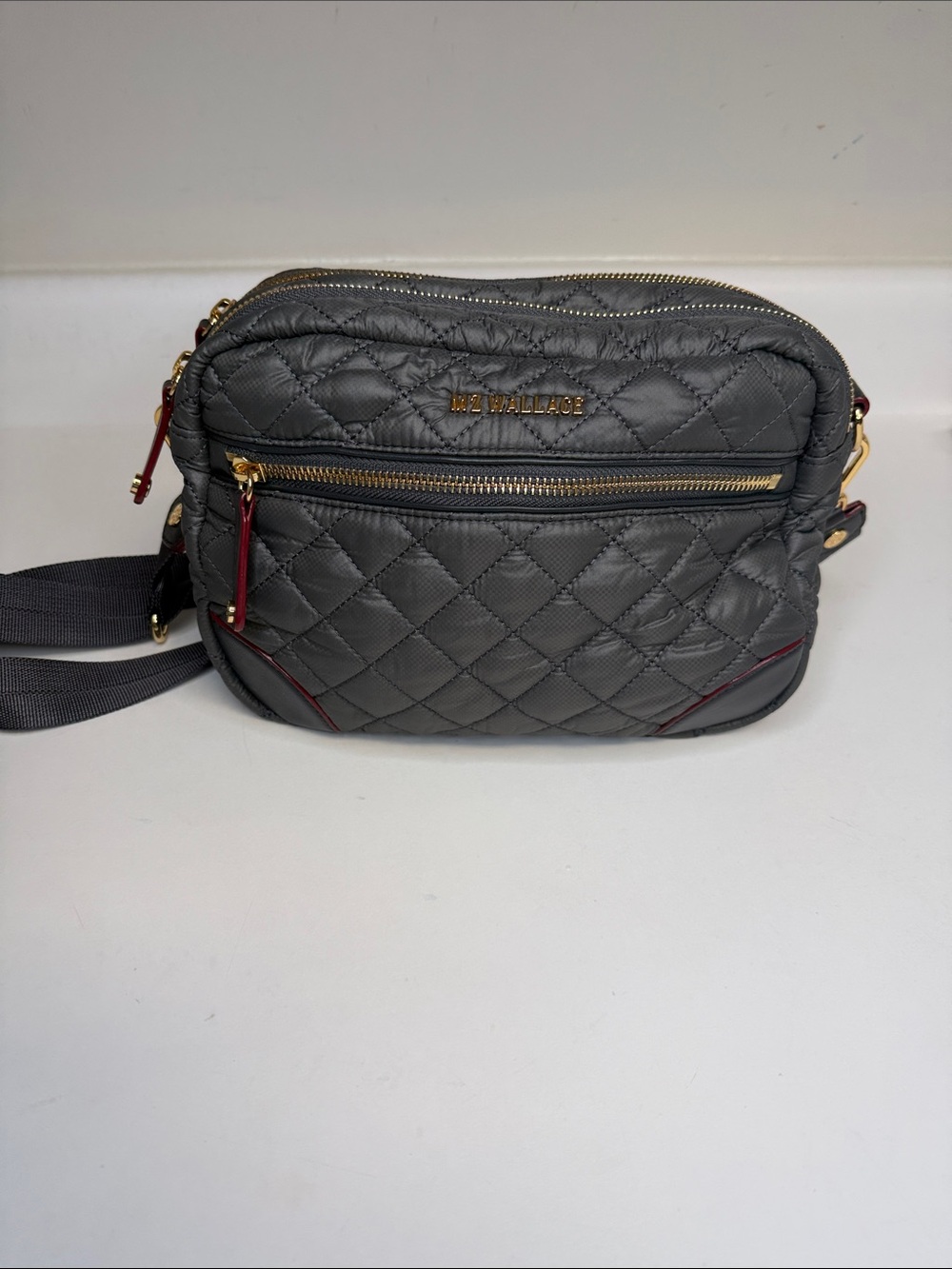 MZ Wallace Small Crosby Gray Crossbody Bag with gold tone hardware